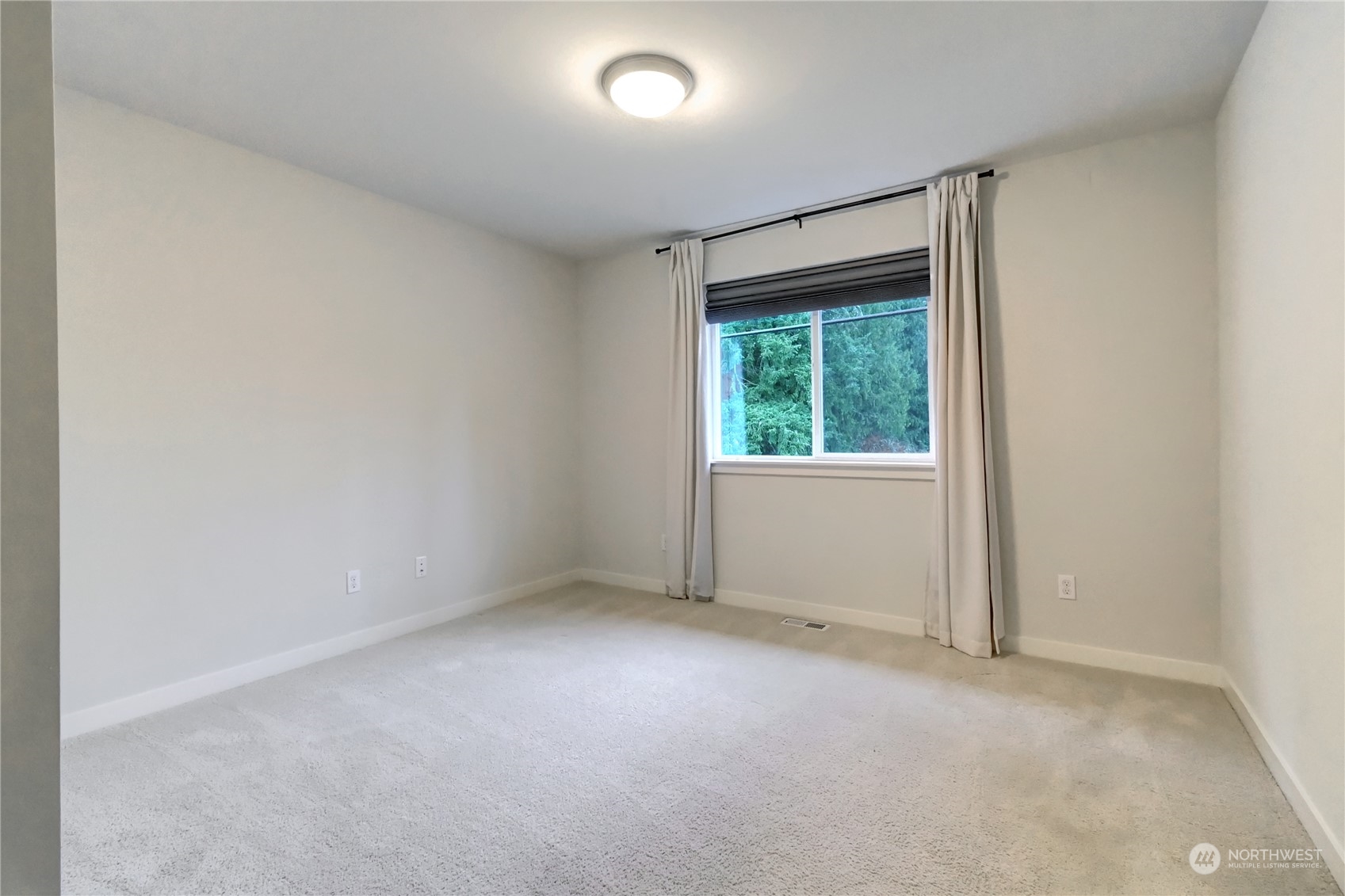 4431 231st Place Southeast Bothell, WA 98021 - Photo 28 of 36 an empty room with a window