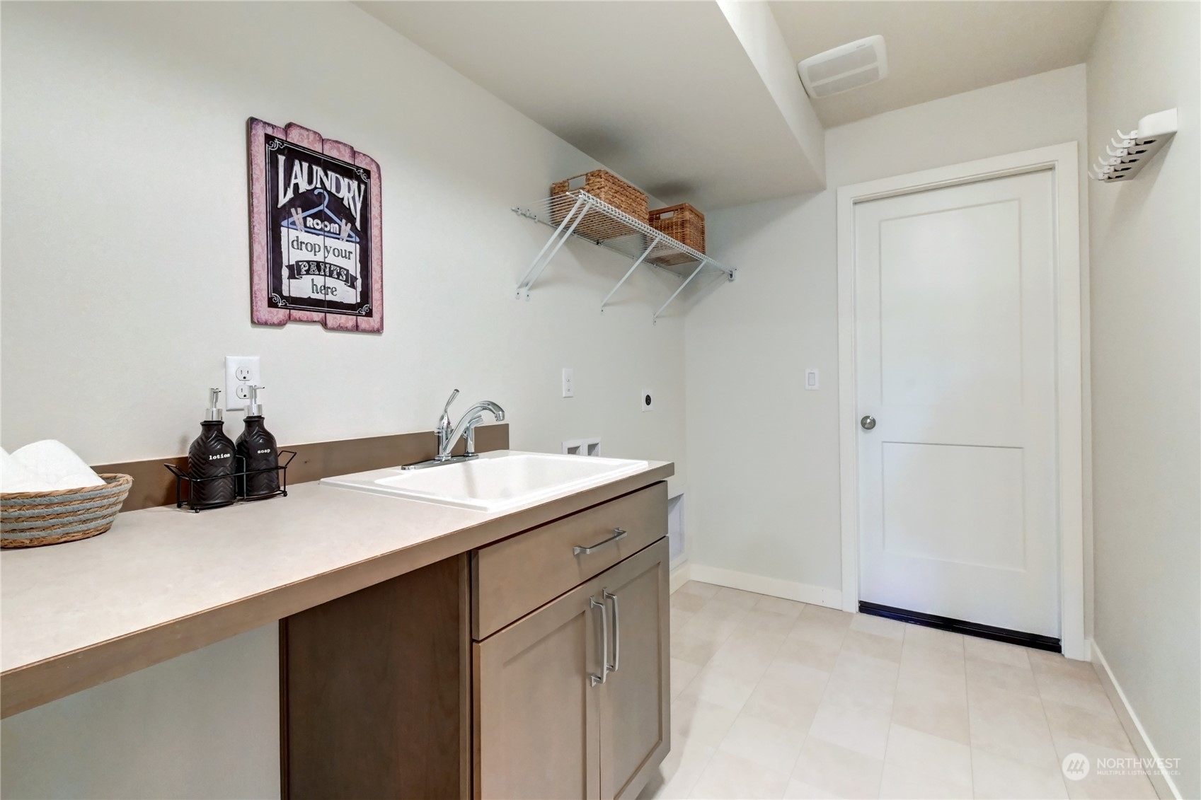4431 231st Place Southeast Bothell, WA 98021 - Photo 31 of 36 a bathroom with a sink and a mirror