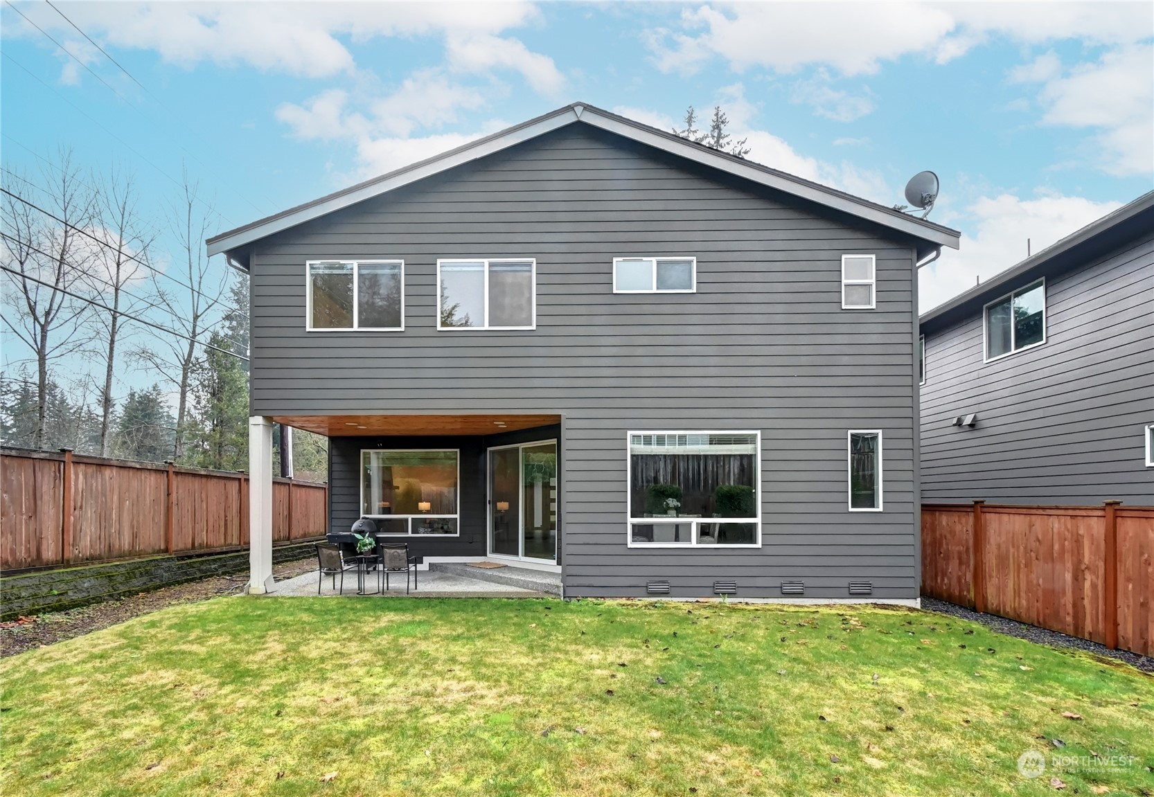 4431 231st Place Southeast Bothell, WA 98021 - Photo 33 of 36 a view of a house with a yard