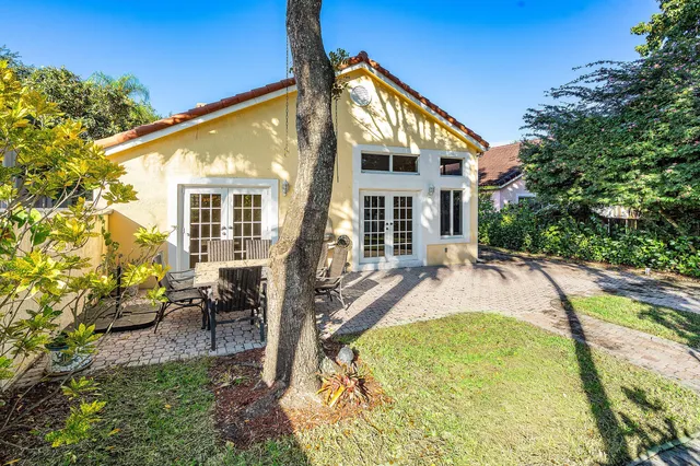 a view of swimming pool with outdoor seating