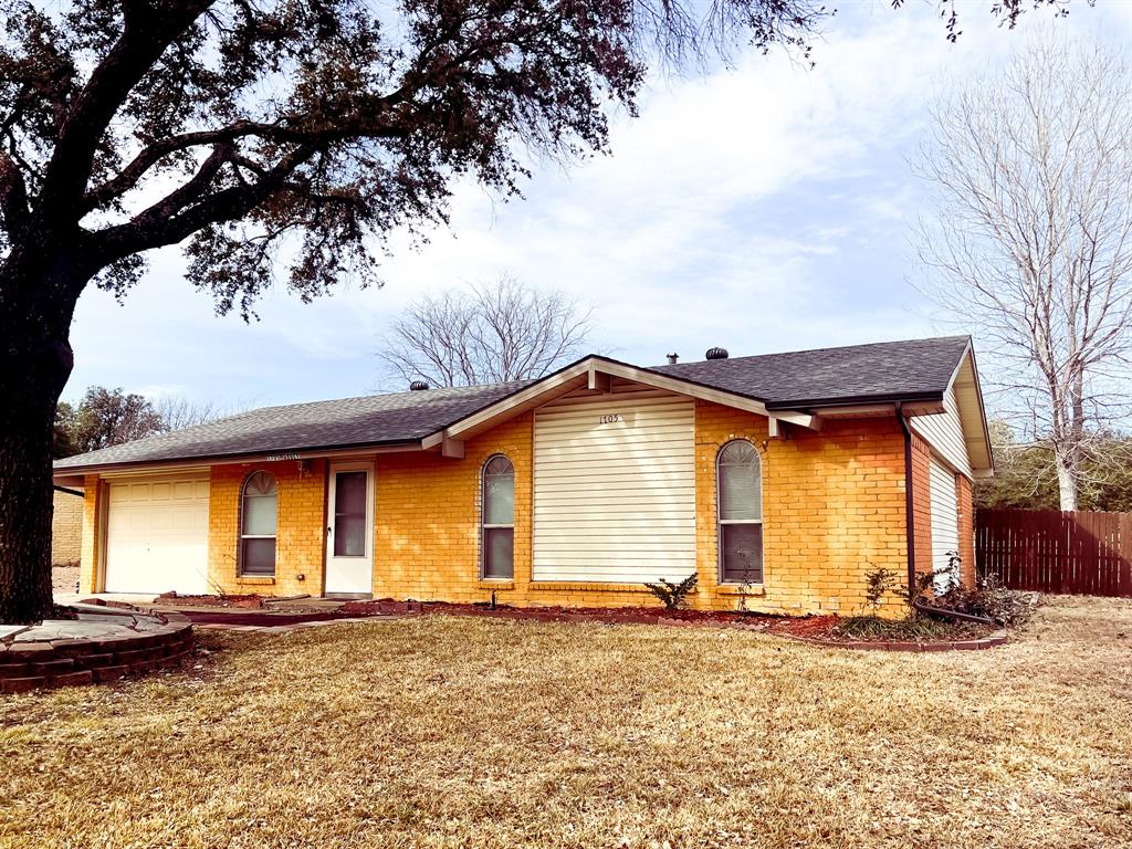 1705 Abbey Road Plano, TX 75074 - Photo 1 of 1 a front view of a house with a yard