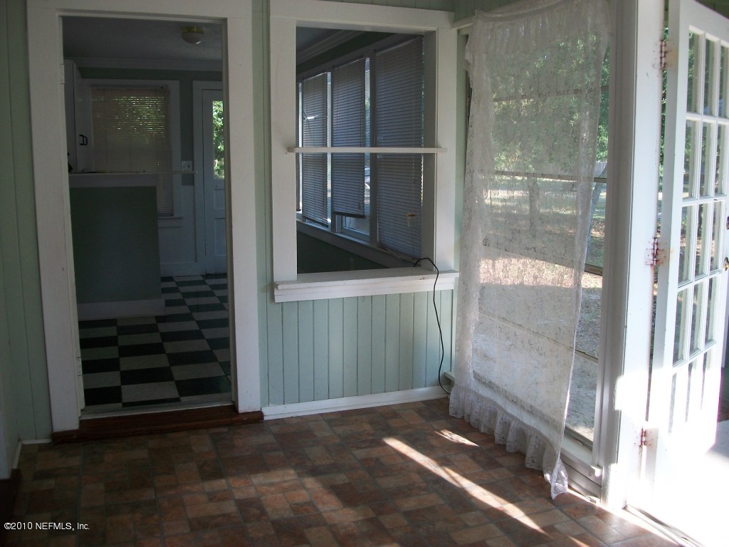 96519 Chester Road Yulee, FL 32097 - Photo 4 of 5 a view of a door of a house with a glass door