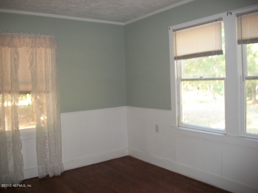 96519 Chester Road Yulee, FL 32097 - Photo 5 of 5 a view of an empty room with a window