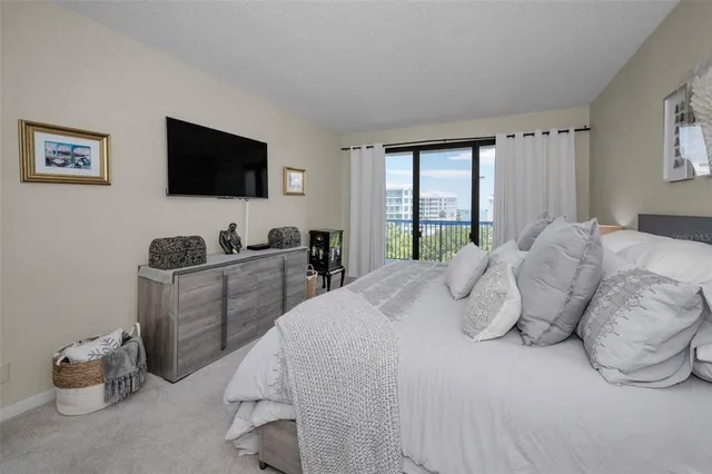 a view of a room with wooden floor and balcony