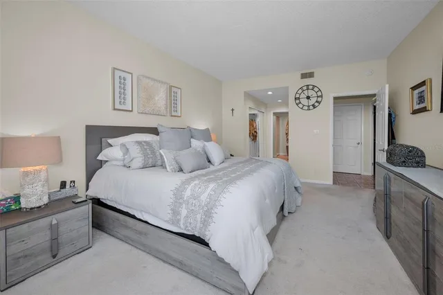 a kitchen with stainless steel appliances granite countertop a stove and a microwave