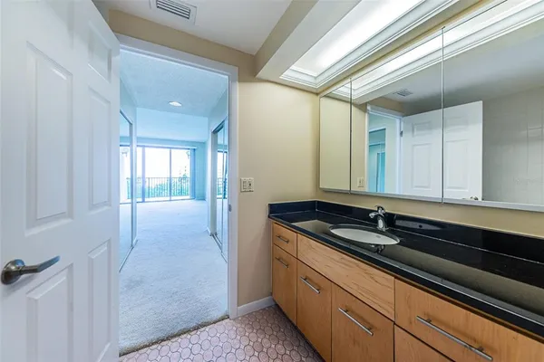 a bathroom with a bathtub and a sink