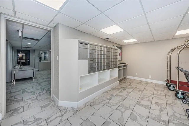 a view of a swimming pool with an outdoor seating