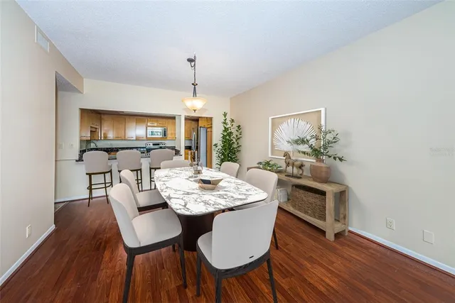 a view of a room with wooden floor and balcony