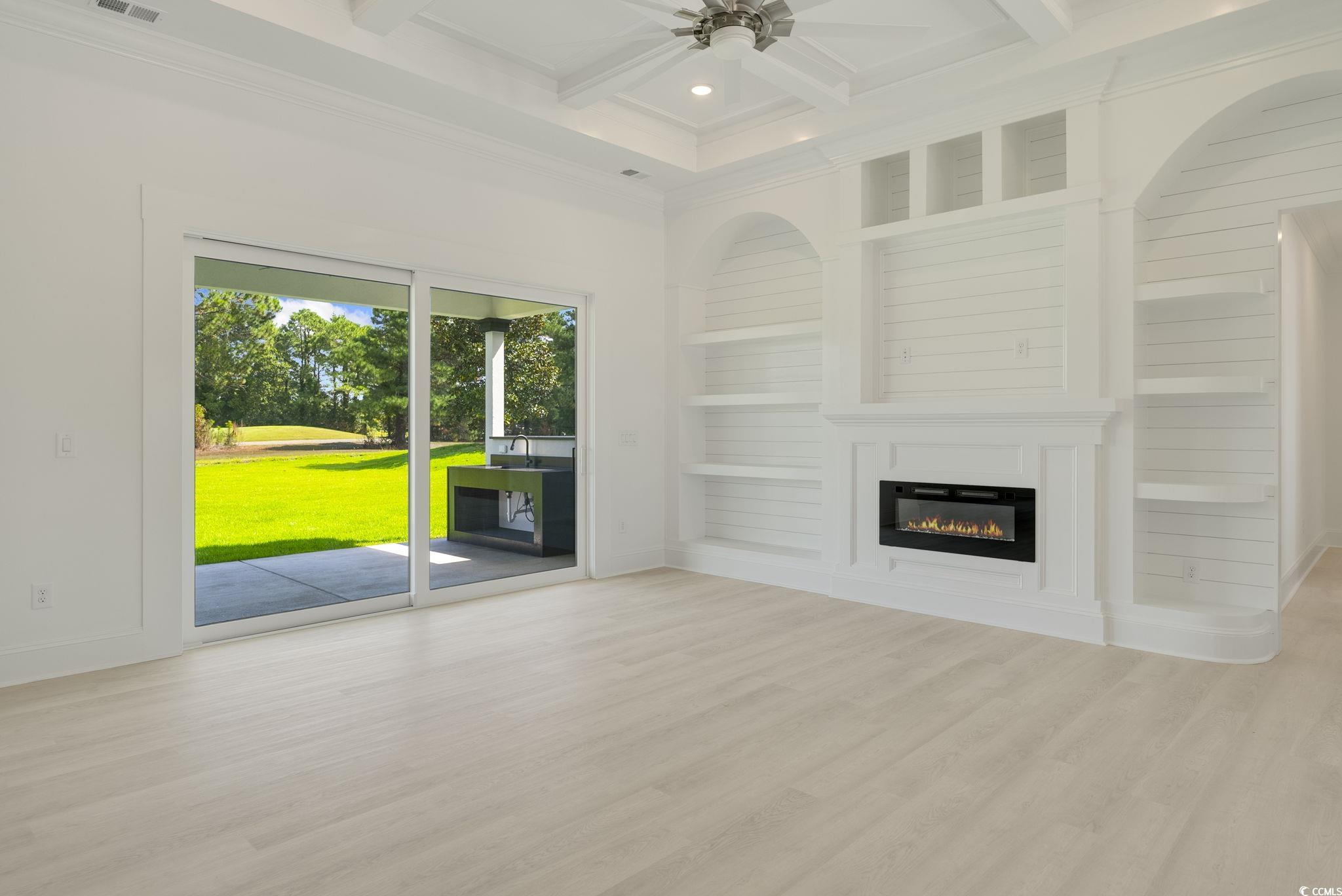 1109 Whooping Crane Drive Conway, SC 29526 - Photo 15 of 39 Unfurnished living room with light wood-type floor