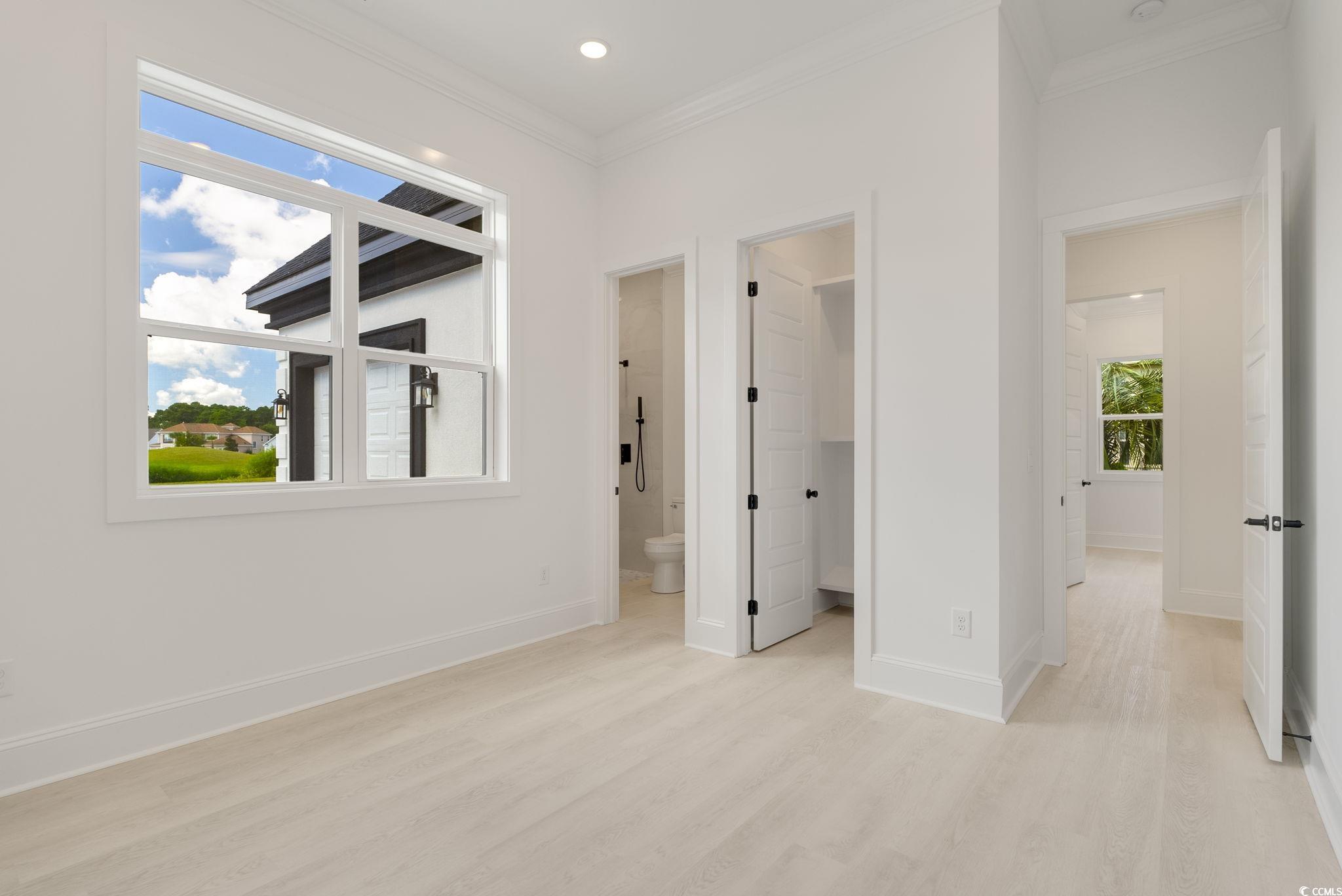 1109 Whooping Crane Drive Conway, SC 29526 - Photo 16 of 39 Unfurnished bedroom with light hardwood / wood-sty