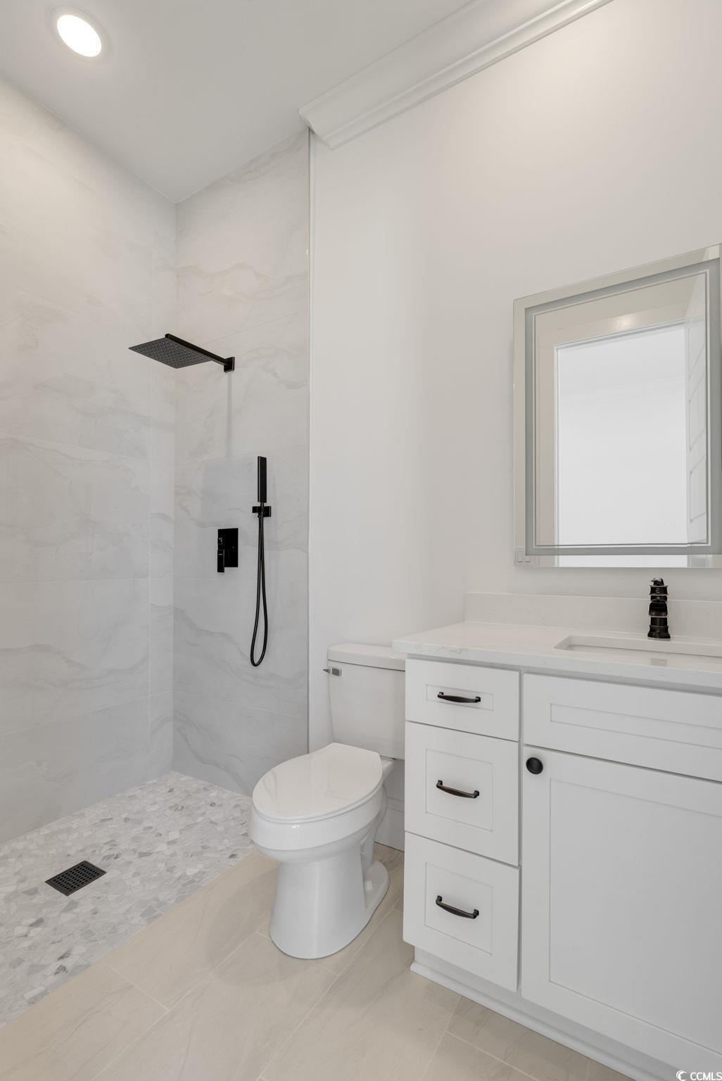 1109 Whooping Crane Drive Conway, SC 29526 - Photo 18 of 39 Bathroom with a tile shower, tile patterned floors