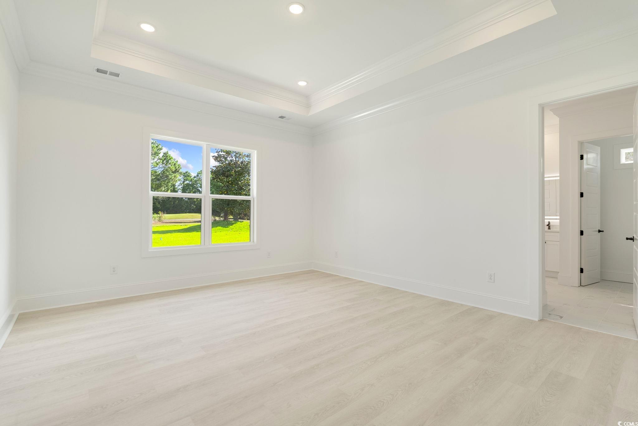 1109 Whooping Crane Drive Conway, SC 29526 - Photo 19 of 39 Unfurnished room with light hardwood / wood-style