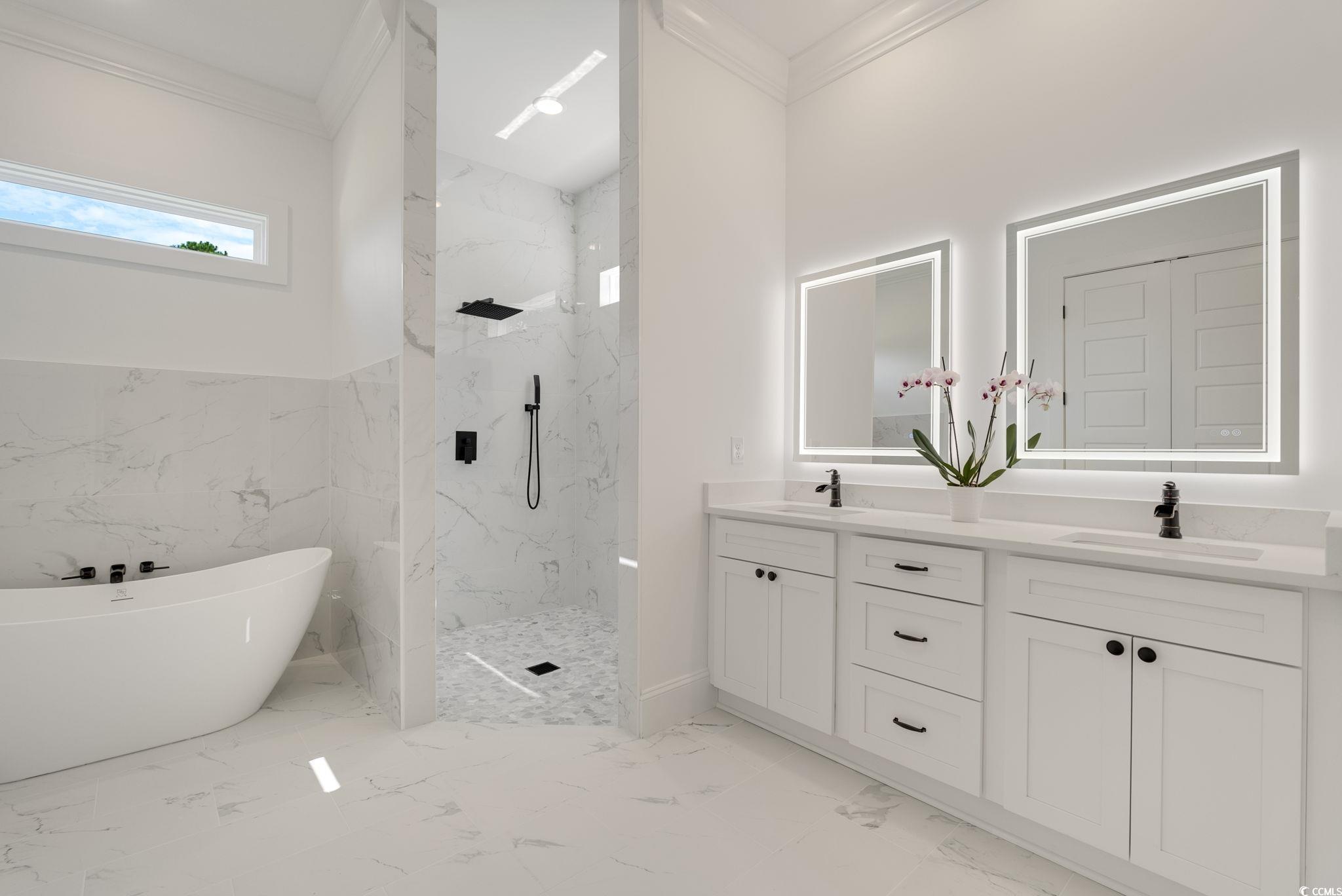 1109 Whooping Crane Drive Conway, SC 29526 - Photo 20 of 39 Bathroom with crown molding, shower with separate