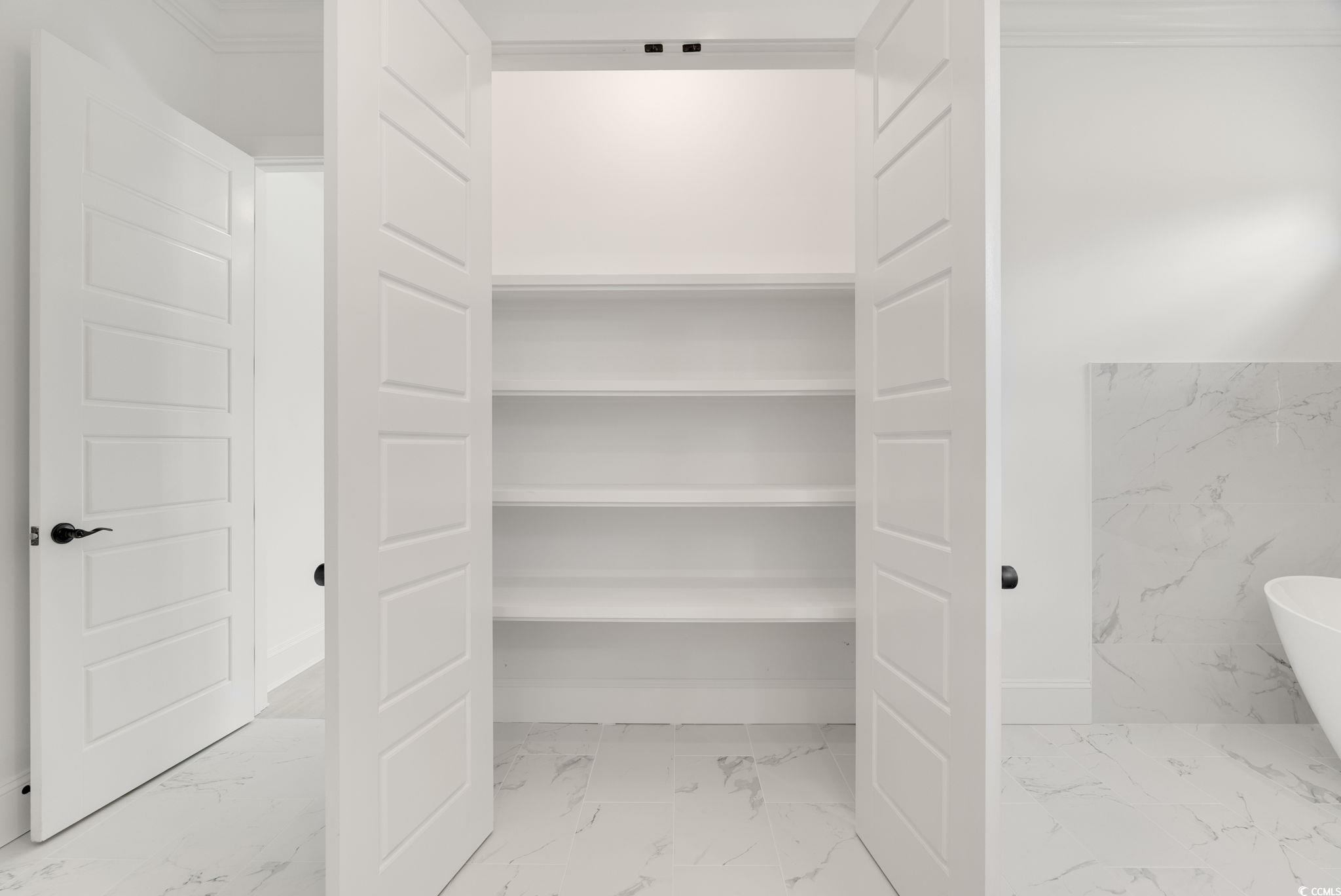 1109 Whooping Crane Drive Conway, SC 29526 - Photo 23 of 39 Linen Closet in main bathroom