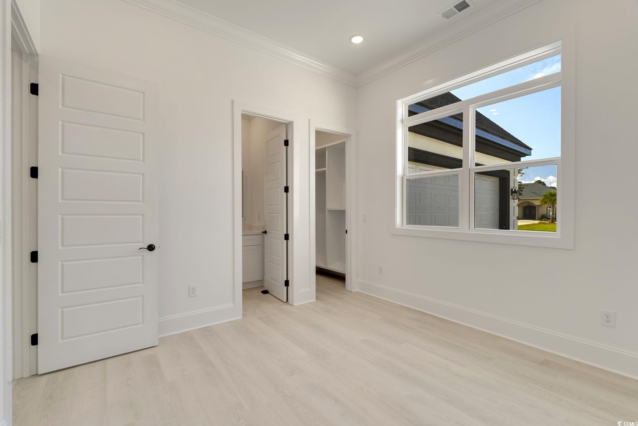 1109 Whooping Crane Drive Conway, SC 29526 - Photo 25 of 39 Unfurnished bedroom featuring light hardwood / woo