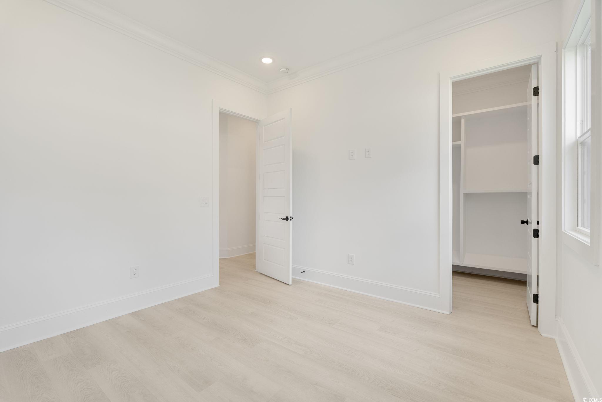 1109 Whooping Crane Drive Conway, SC 29526 - Photo 29 of 39 Unfurnished bedroom with a spacious closet, light