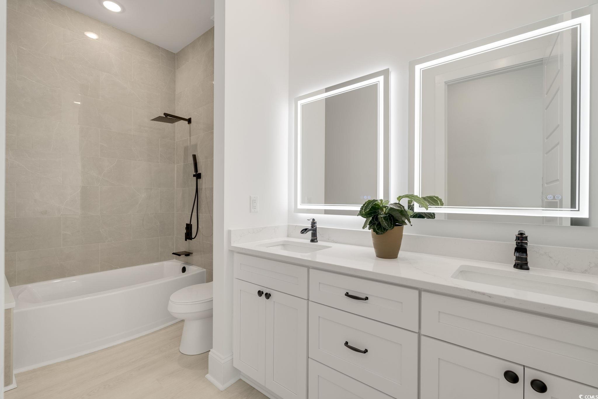 1109 Whooping Crane Drive Conway, SC 29526 - Photo 30 of 39 Full bathroom with hardwood / wood-style floors, v