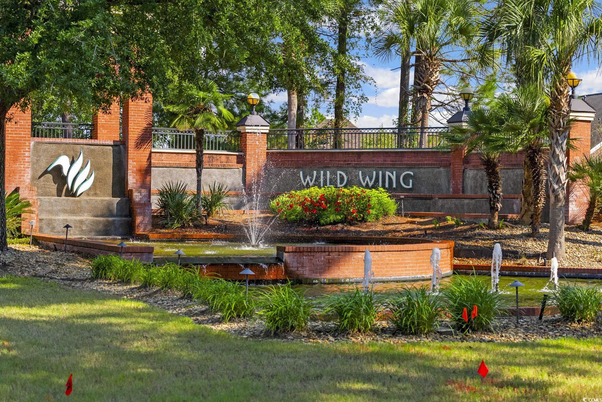 1109 Whooping Crane Drive Conway, SC 29526 - Photo 35 of 39 Community / neighborhood sign with a yard
