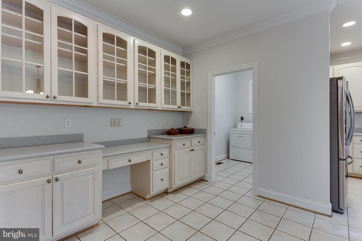 8002 Overhill Road Bethesda, MD 20814 - Photo 14 of 30 Leads to laundry room and 2-car garage