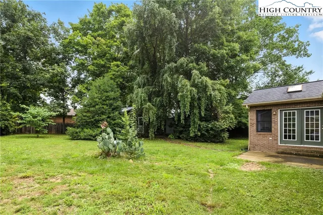a view of a backyard with a garden