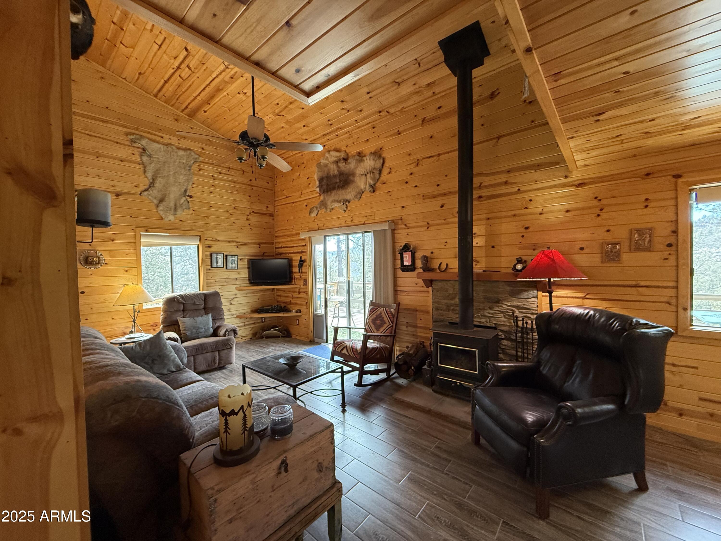22761 South Eagle Mine Road Crown King, AZ 86343 - Photo 6 of 34 Cozy wood burning stove