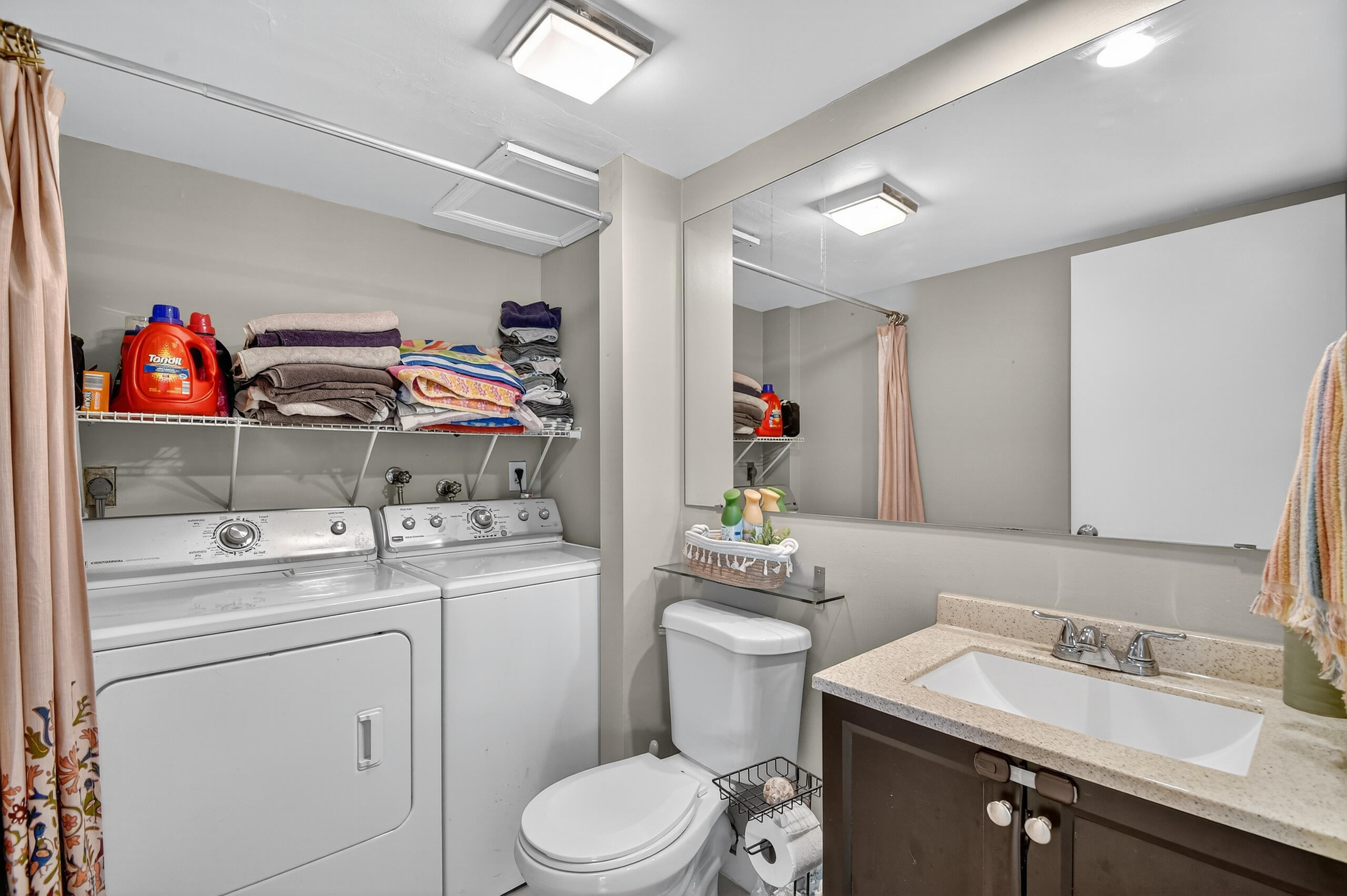 1540 Masters Circle, Unit 180 Delray Beach, FL 33445 - Photo 12 of 28 a utility room with sink dryer and washer