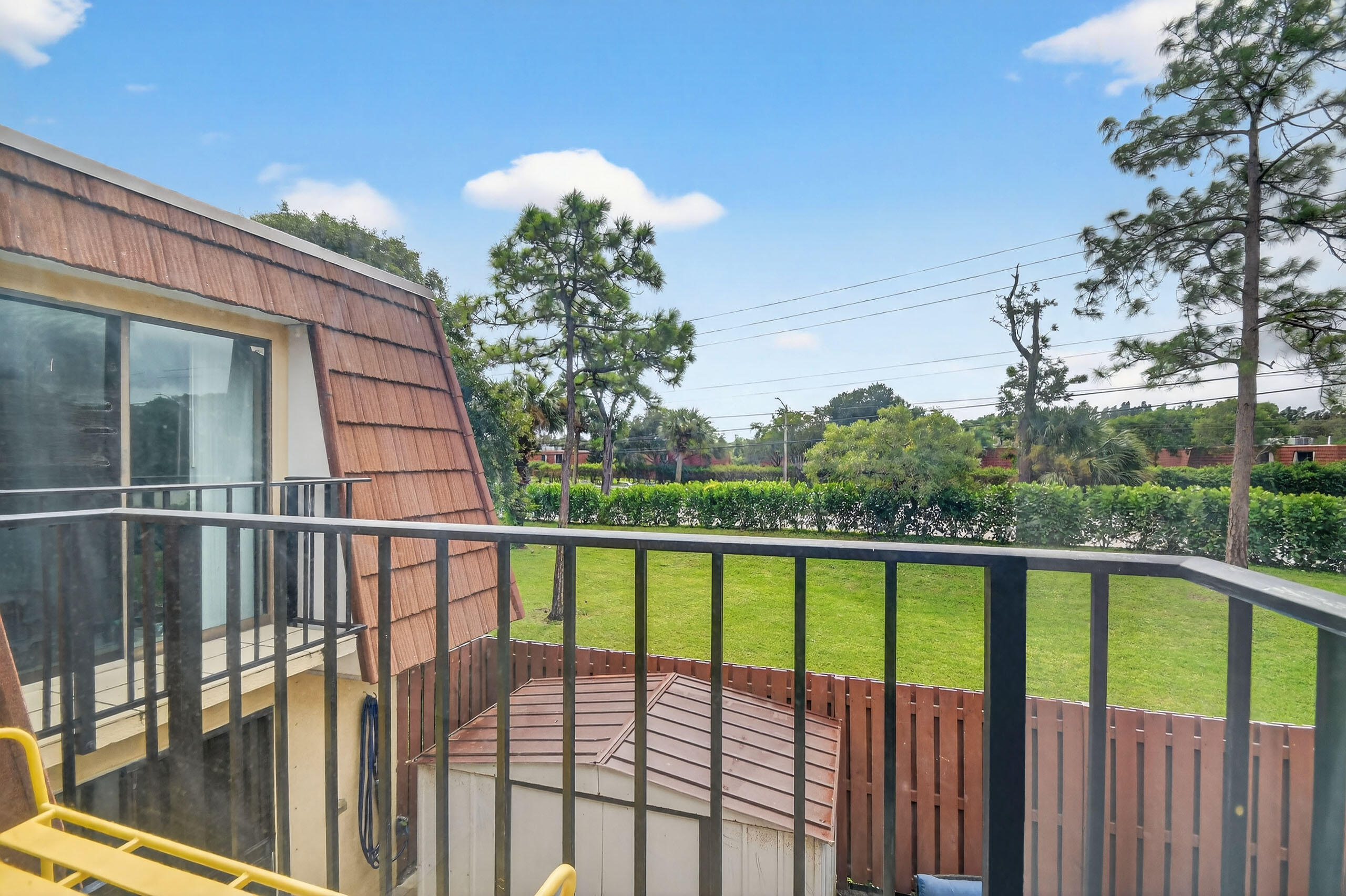 1540 Masters Circle, Unit 180 Delray Beach, FL 33445 - Photo 21 of 28 a view of a balcony