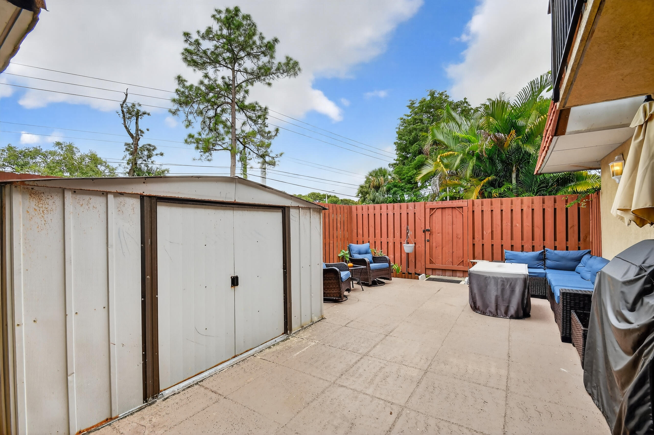 1540 Masters Circle, Unit 180 Delray Beach, FL 33445 - Photo 23 of 28 a view of outdoor space with seating area