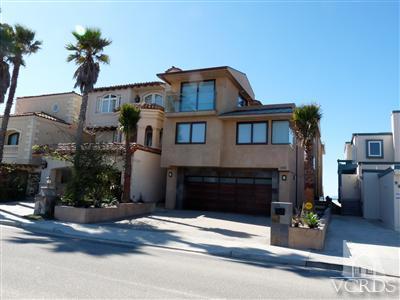 905 Mandalay Beach Road Oxnard, CA 93035 - Photo 2 of 30 a front view of a house with a yard