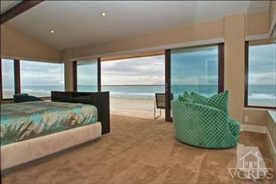 905 Mandalay Beach Road Oxnard, CA 93035 - Photo 24 of 30 a bedroom with a large bed and a window