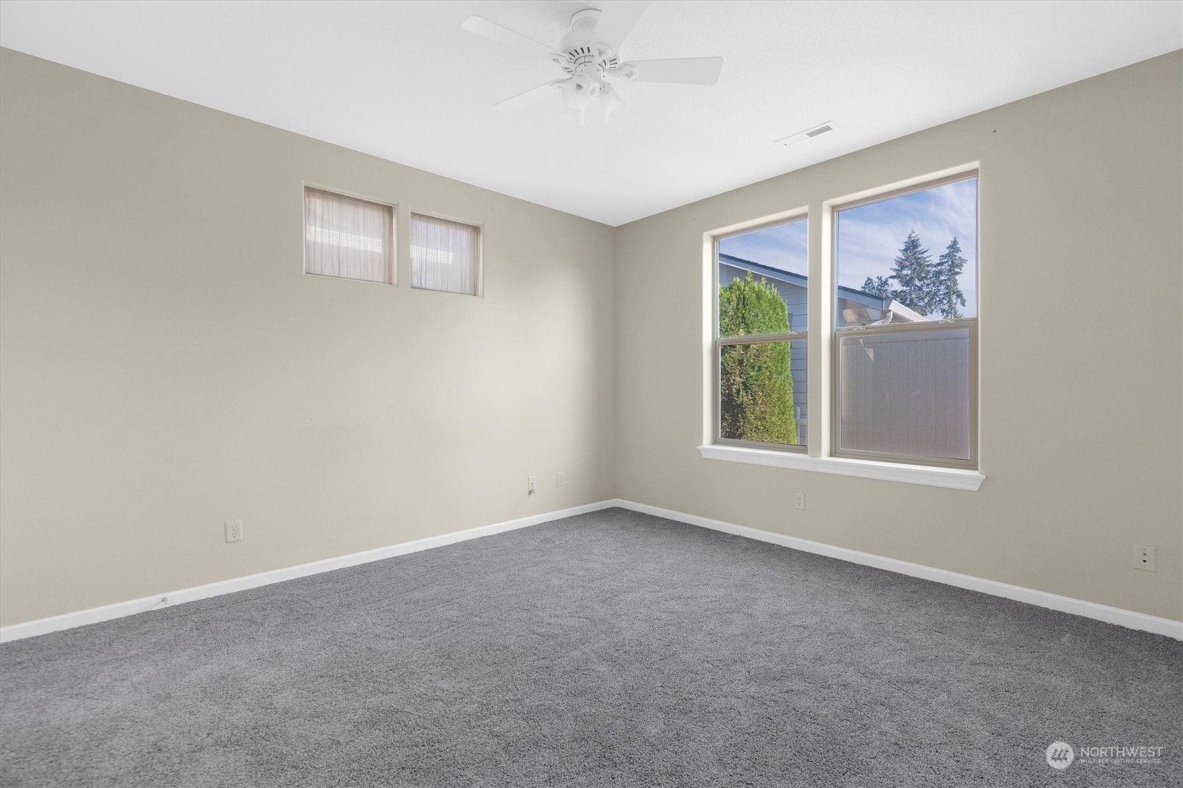112 Willow Pointe Loop, Unit 112 Longview, WA 98632 - Photo 13 of 21 a view of an empty room with a window