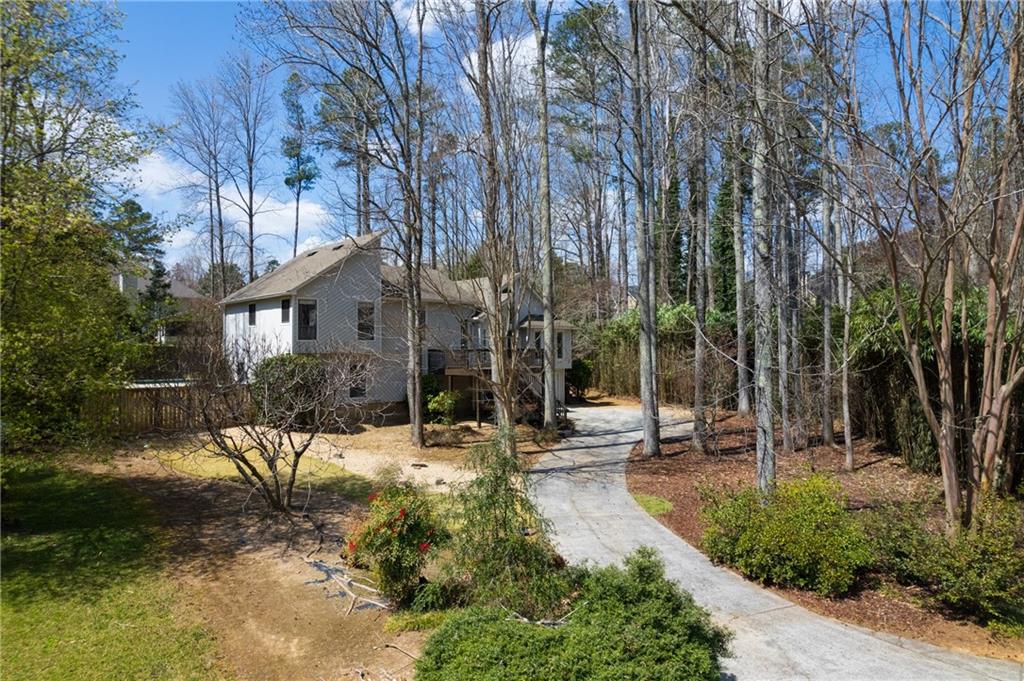 3239 Rangers Gate Marietta, GA 30062 - Photo 1 of 1 Lush foliage & long drive way