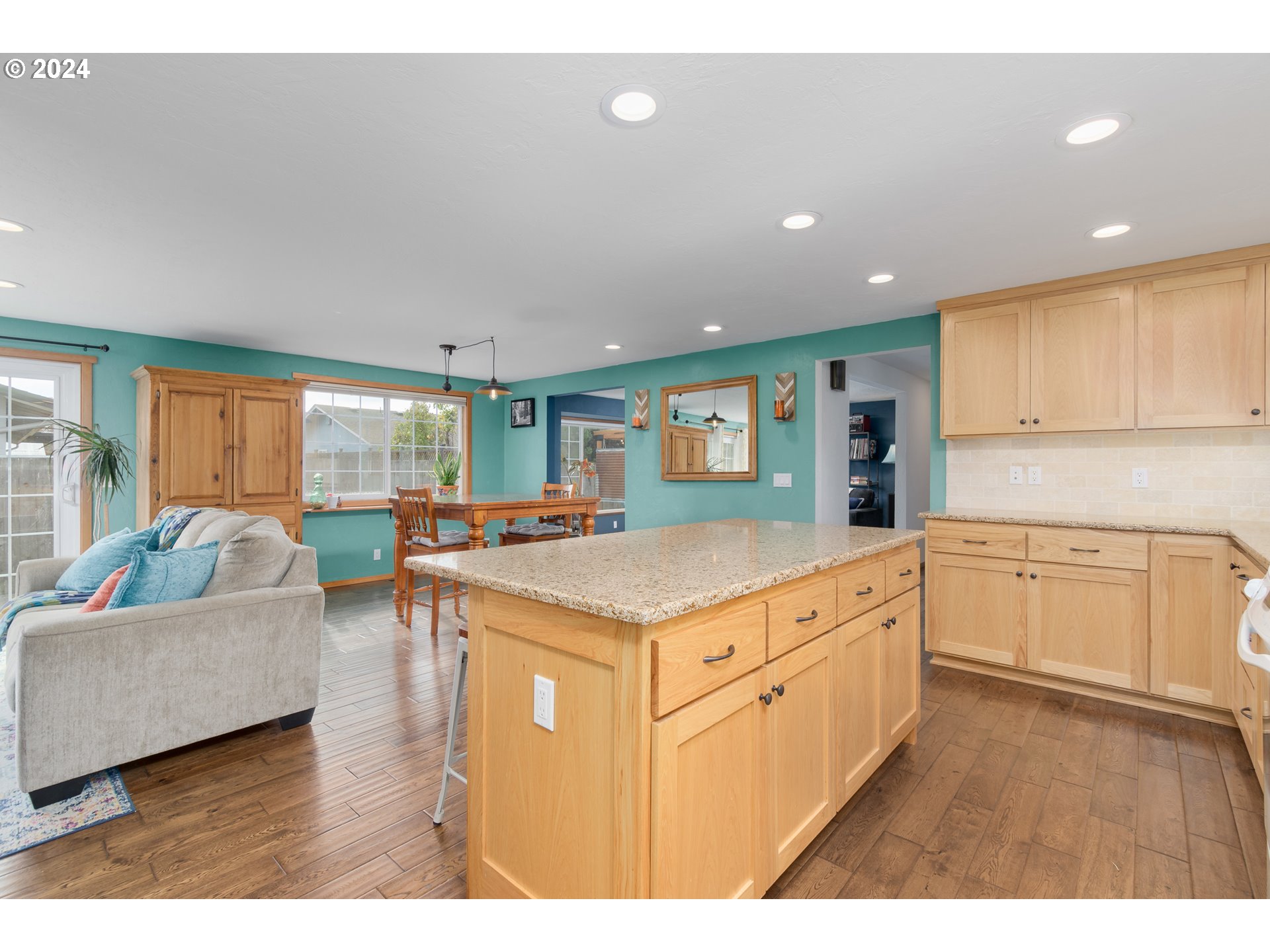 3456 Tempa Street Eugene, OR 97404 - Photo 13 of 48 a living room with stainless steel appliances granite countertop furniture and a kitchen view