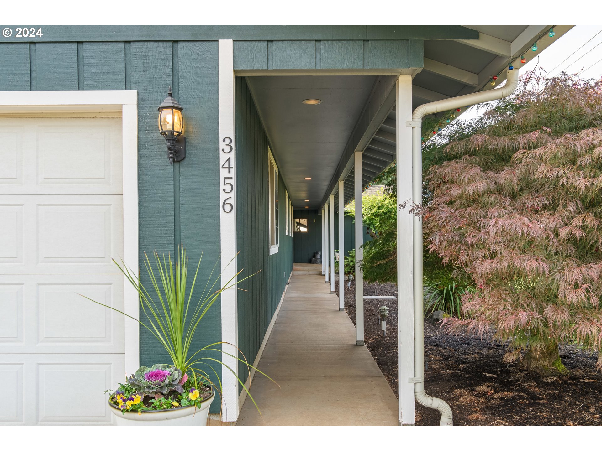 3456 Tempa Street Eugene, OR 97404 - Photo 3 of 48 a view of a back yard from a glass door