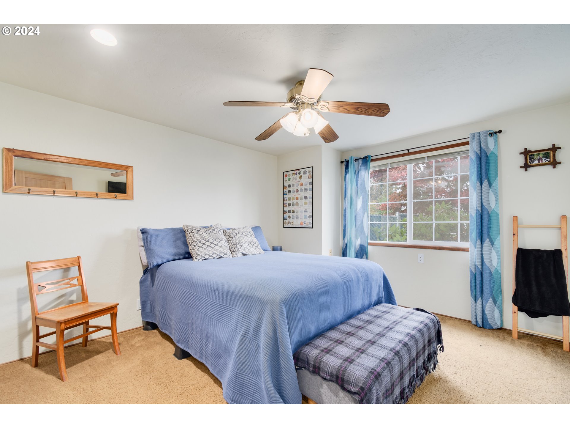 3456 Tempa Street Eugene, OR 97404 - Photo 31 of 48 a bedroom with furniture and a large window