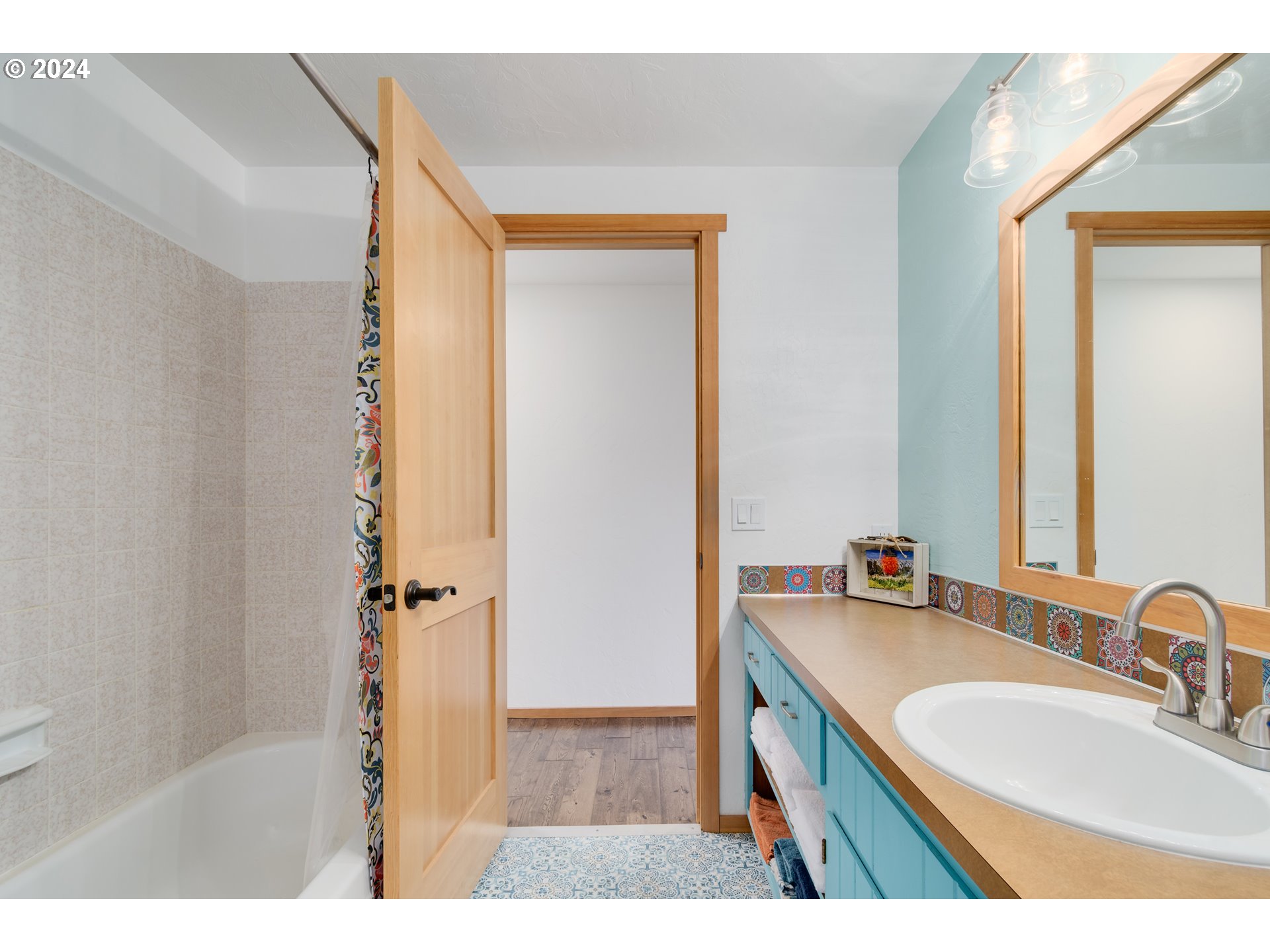 3456 Tempa Street Eugene, OR 97404 - Photo 34 of 48 a bathroom with a sink and a mirror