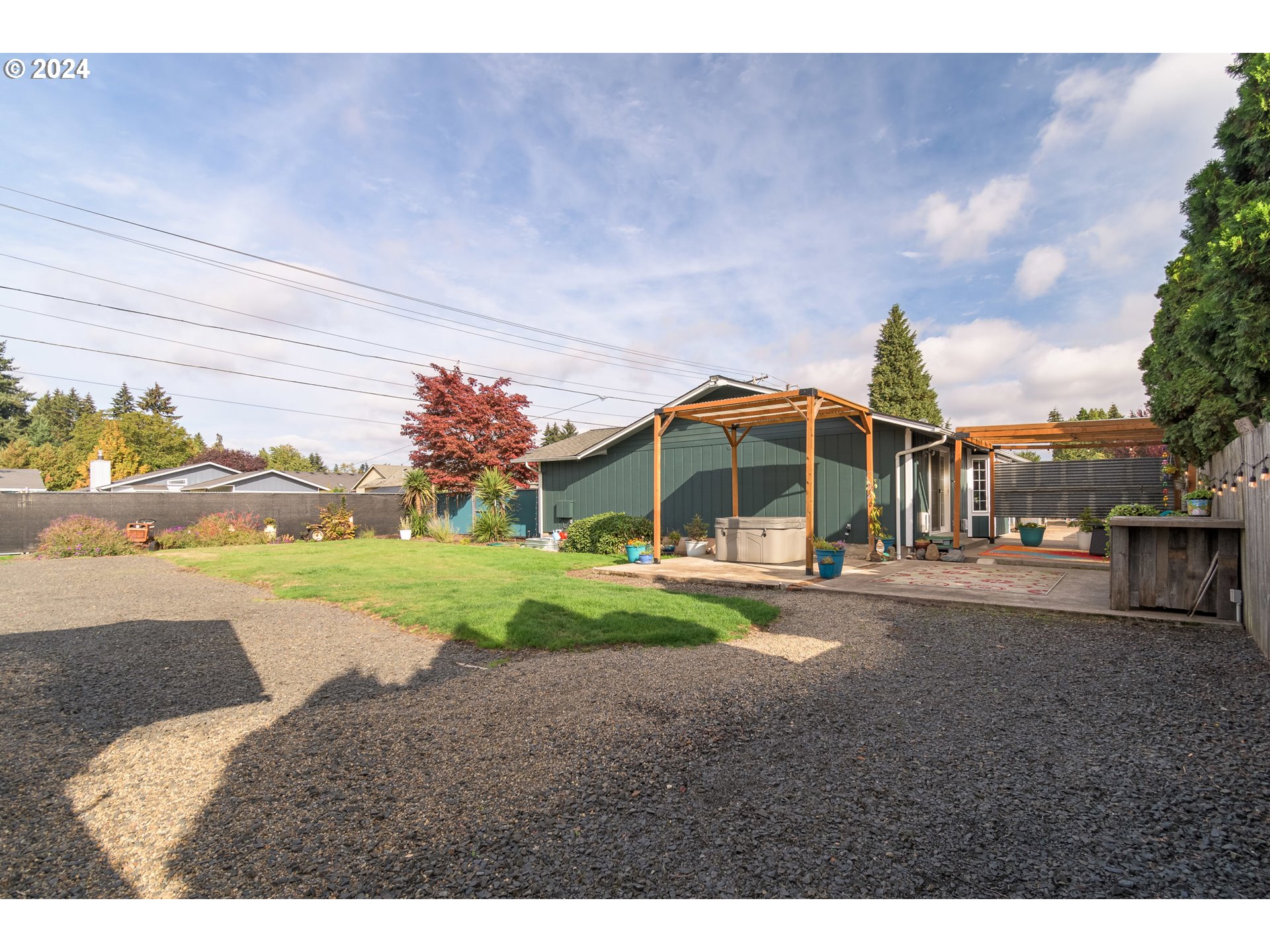 3456 Tempa Street Eugene, OR 97404 - Photo 39 of 48 a view of a house with a yard and pathway