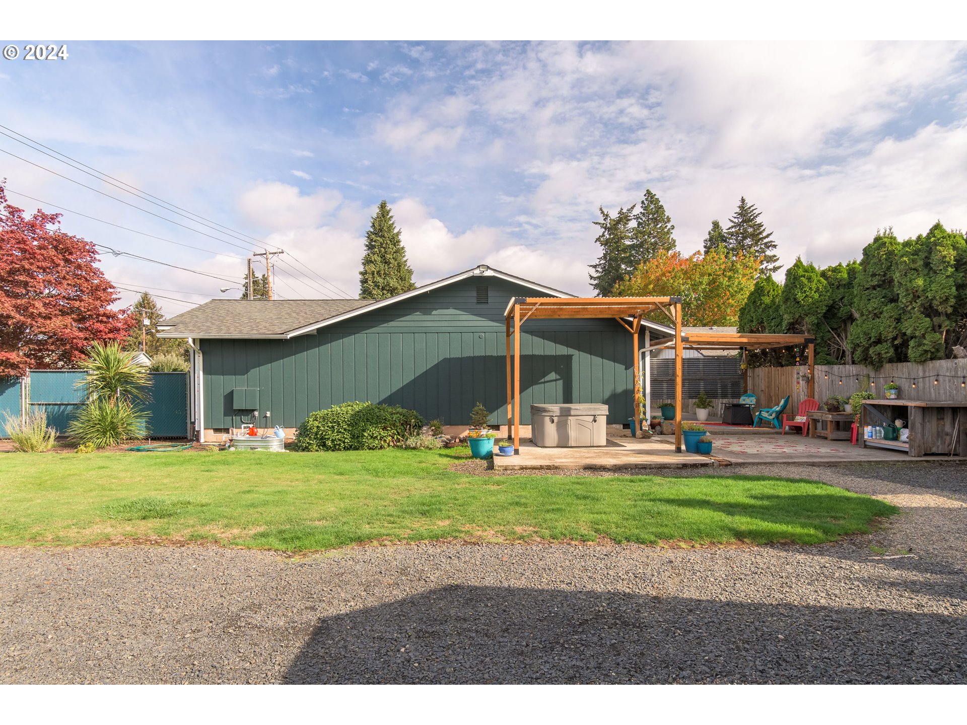 3456 Tempa Street Eugene, OR 97404 - Photo 40 of 48 a view of a house with a yard and sitting area