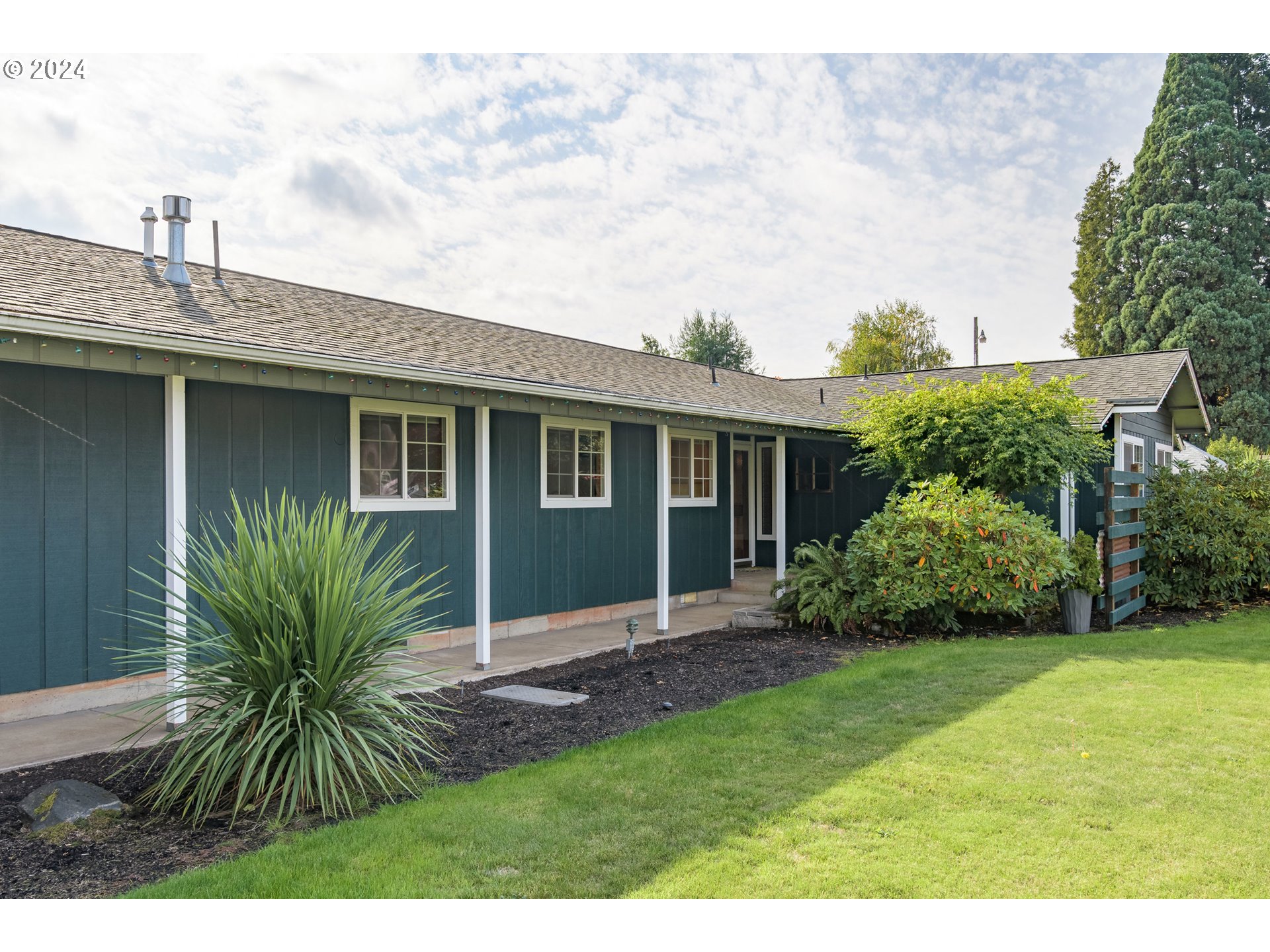 3456 Tempa Street Eugene, OR 97404 - Photo 4 of 48 a view of a house with a yard