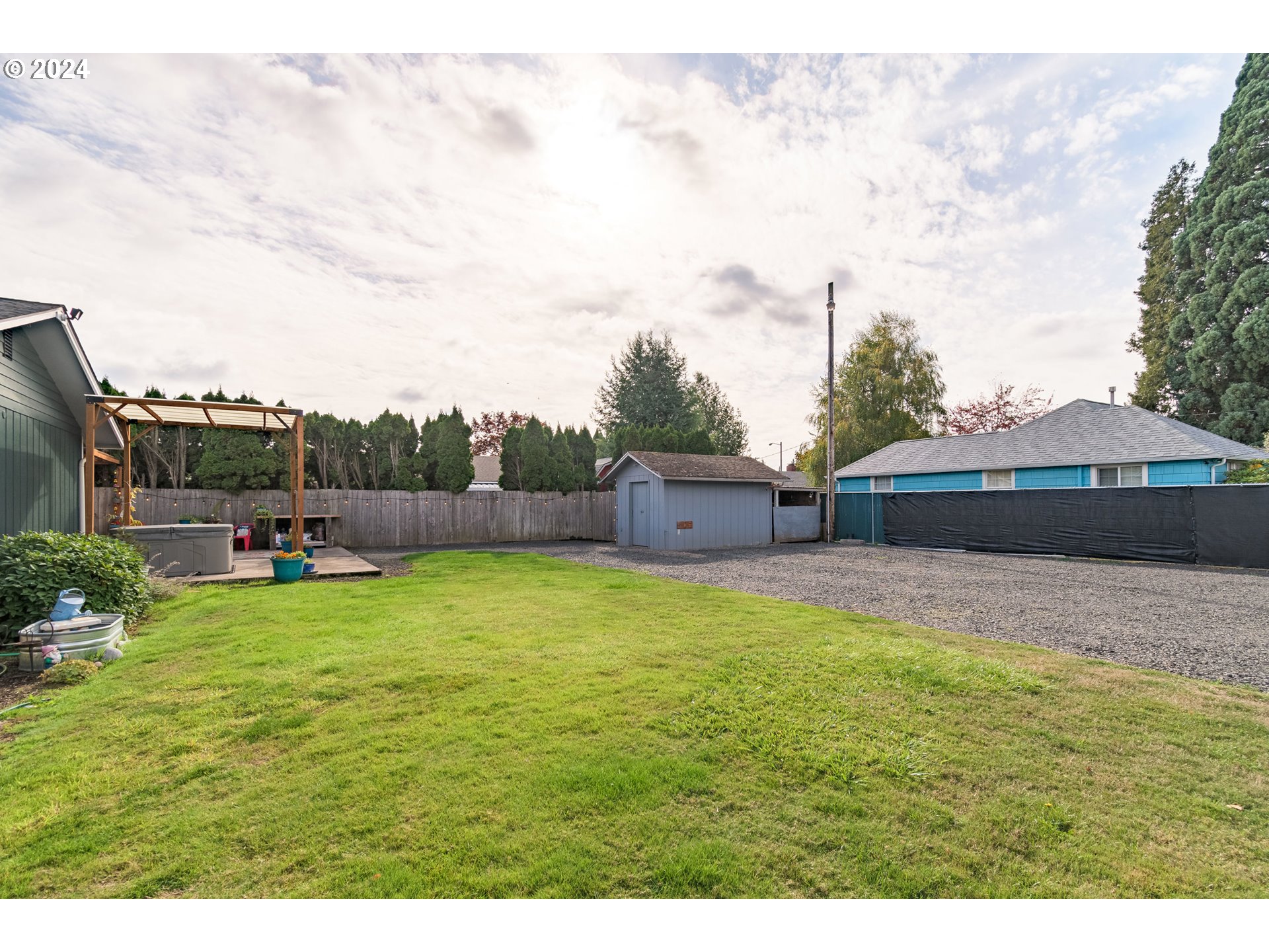 3456 Tempa Street Eugene, OR 97404 - Photo 41 of 48 a house view with swimming pool and trees in the background