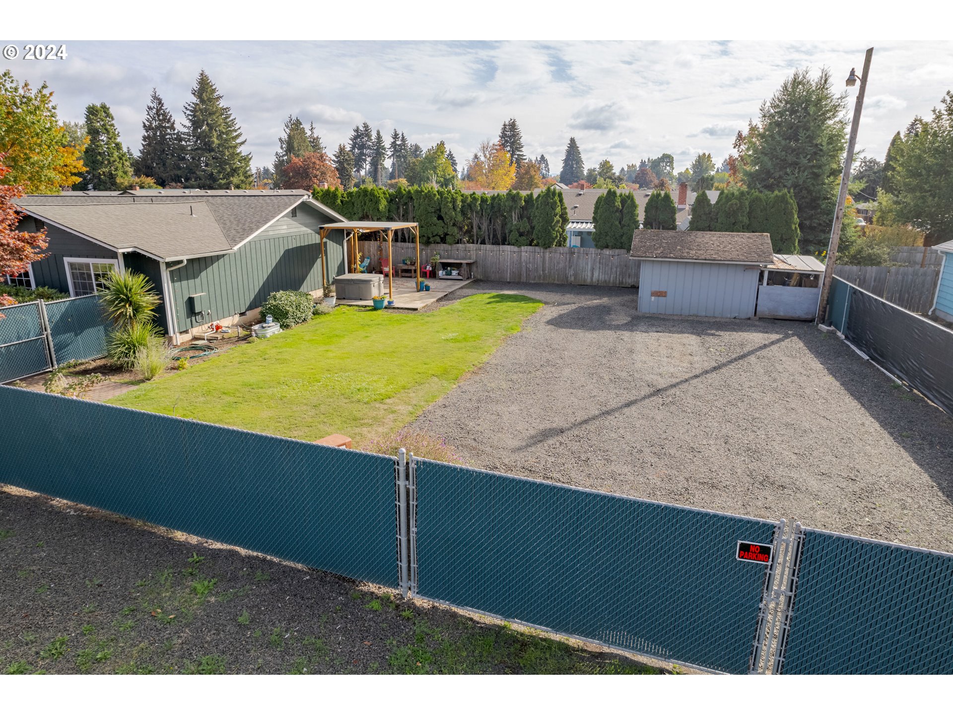 3456 Tempa Street Eugene, OR 97404 - Photo 45 of 48 a view of a swimming pool with a patio and a yard