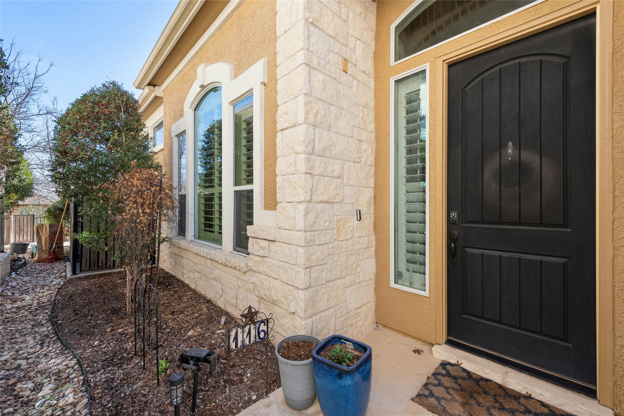 116 Evolutions Path Lakeway, TX 78738 - Photo 3 of 34 Entrance to property featuring stone siding