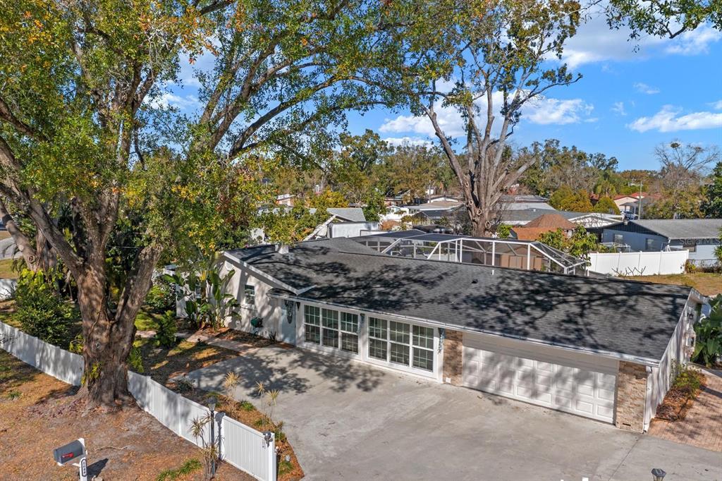 8644 May Circle Tampa, FL 33614 - Photo 22 of 28 a view of a house with a tree