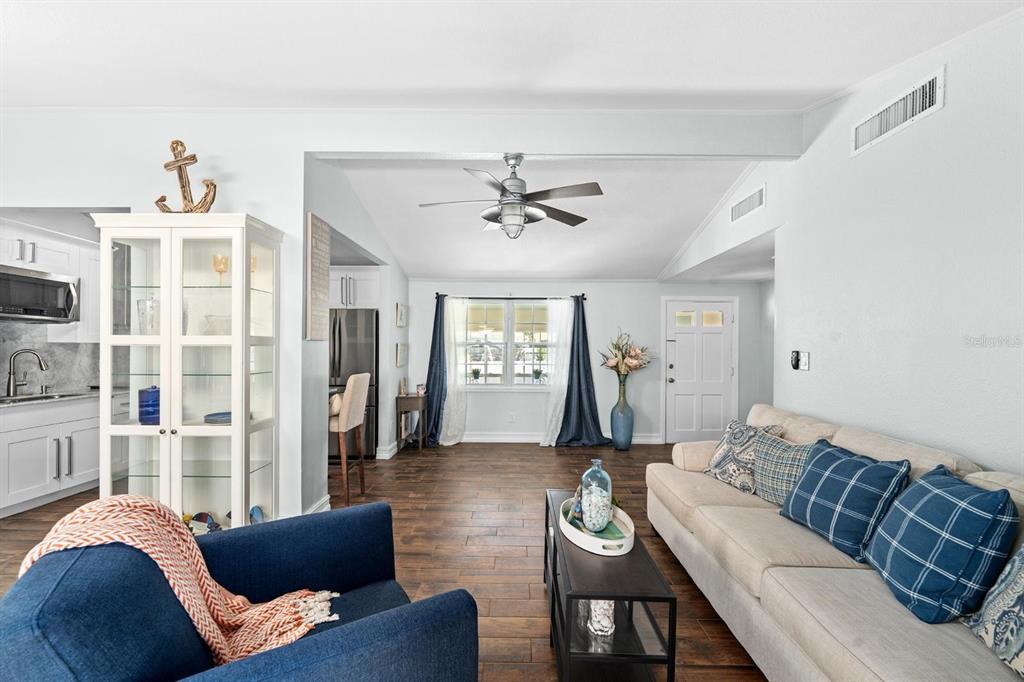 8644 May Circle Tampa, FL 33614 - Photo 4 of 28 a living room with furniture and a large window