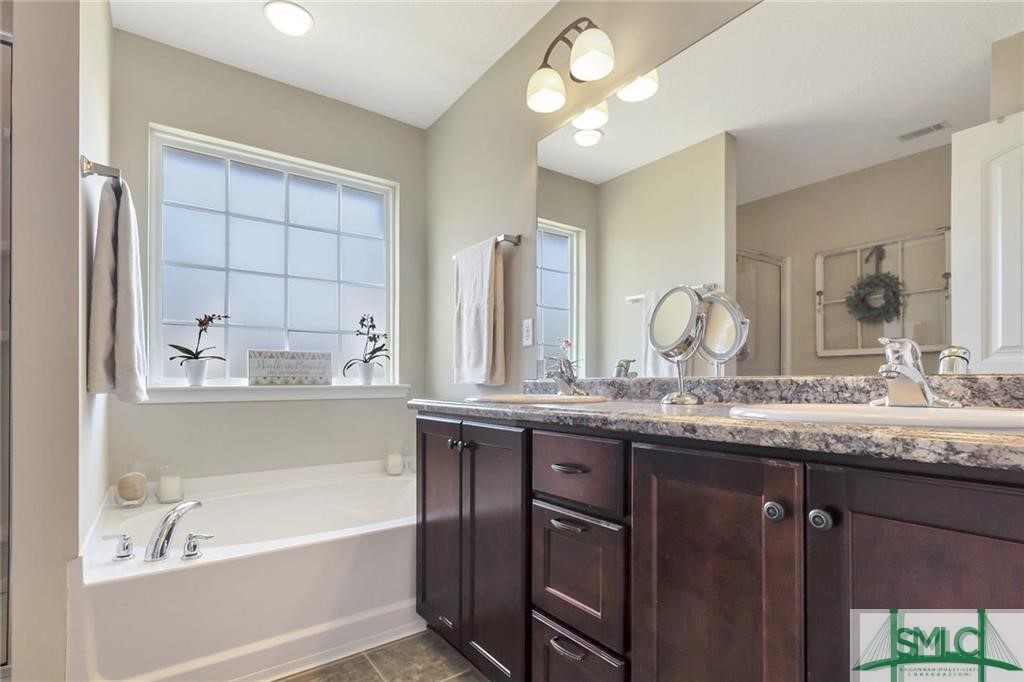 32 Oak Harvest Ridge Midway, GA 31320 - Photo 17 of 21 Owner's bath with soaking tub and separate shower