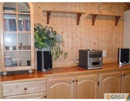 147 Redpine Loop Old Bridge, NJ 08857 - Photo 21 of 25 a bathroom with a granite countertop sink and a potted plant