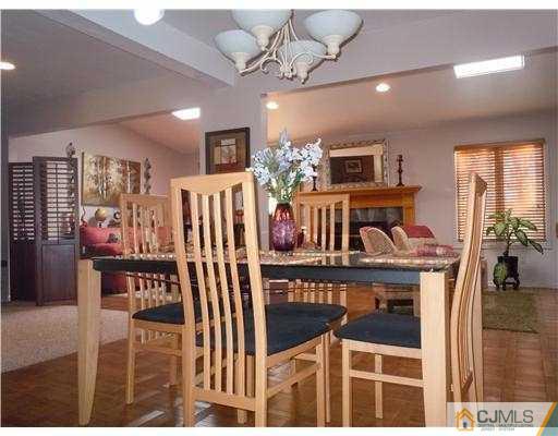 147 Redpine Loop Old Bridge, NJ 08857 - Photo 6 of 25 a view of a dining room with furniture