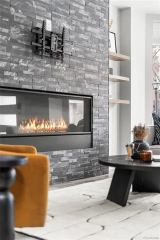 a kitchen with a table chairs sink and cabinets