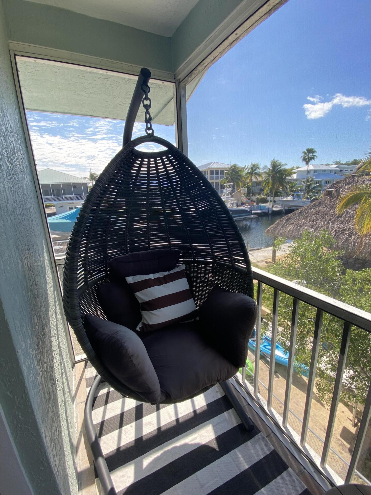 125 3rd Lane Key Largo, FL 33037 - Photo 21 of 24 Porch Swing