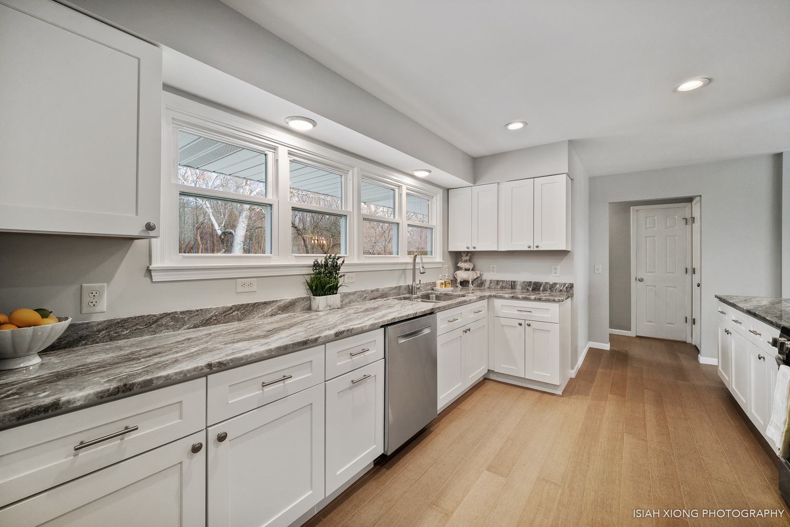 2S203 Green Road Elburn, IL 60119 - Photo 3 of 30 a kitchen with granite countertop white cabinets and white appliances